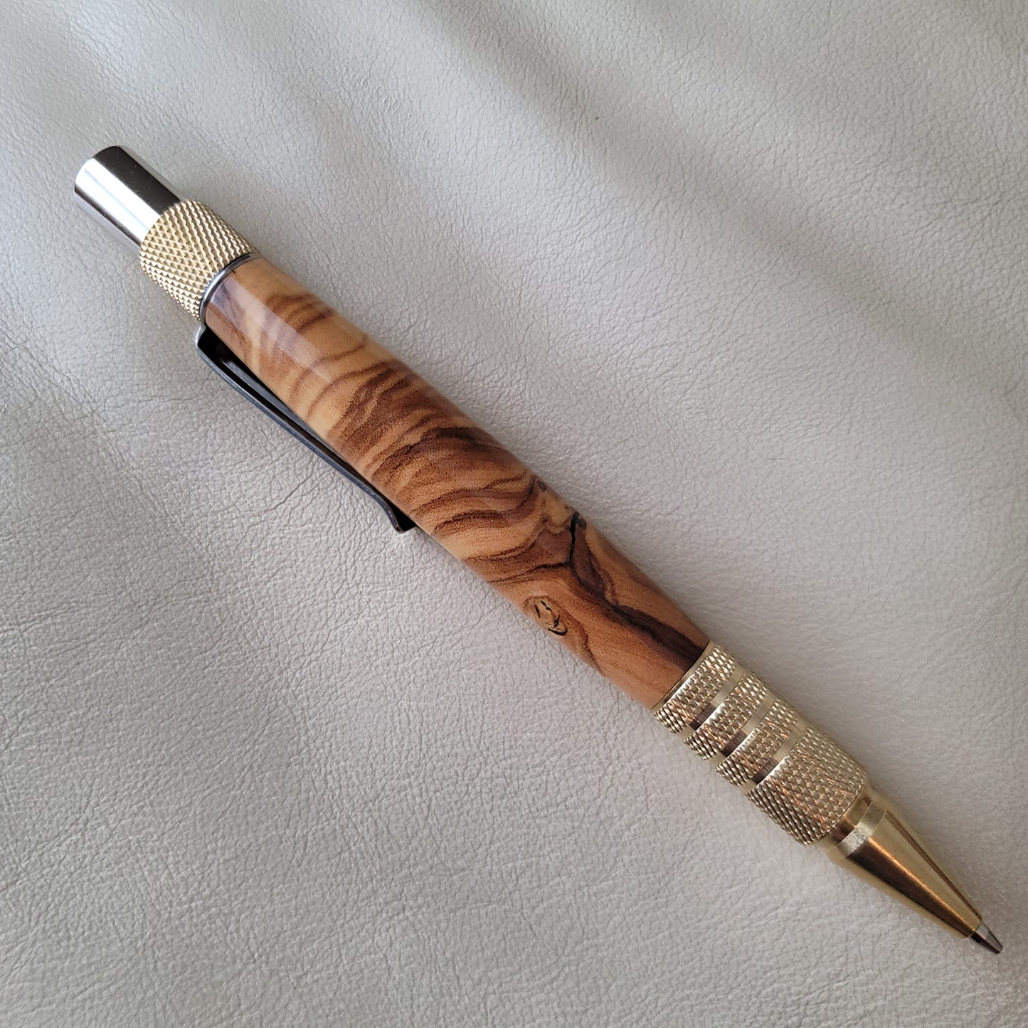 Baba Yaga - Crosscut Olivewood and  Brass Pencil